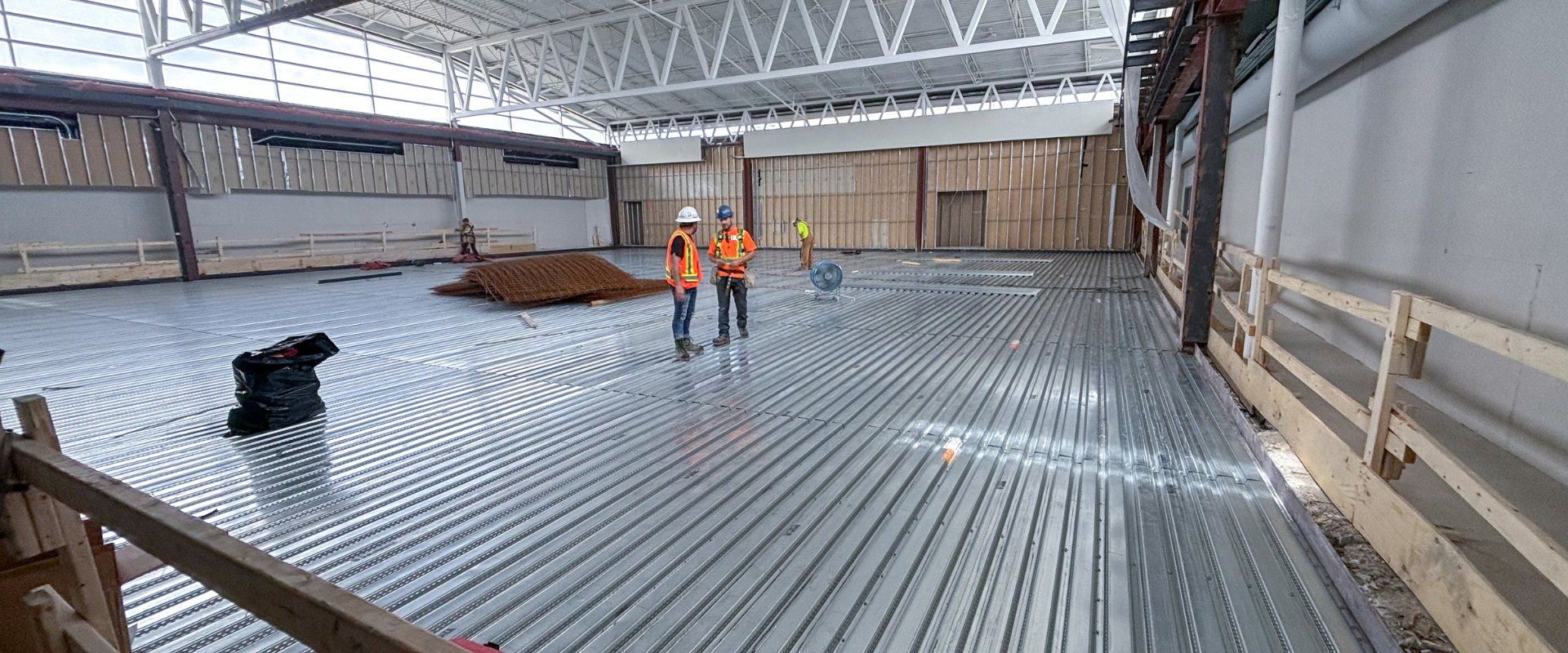 A photo of workers inside a construction zone